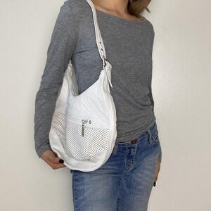 Vintage 00s white perforated leather shoulder bag by Stone Mountain